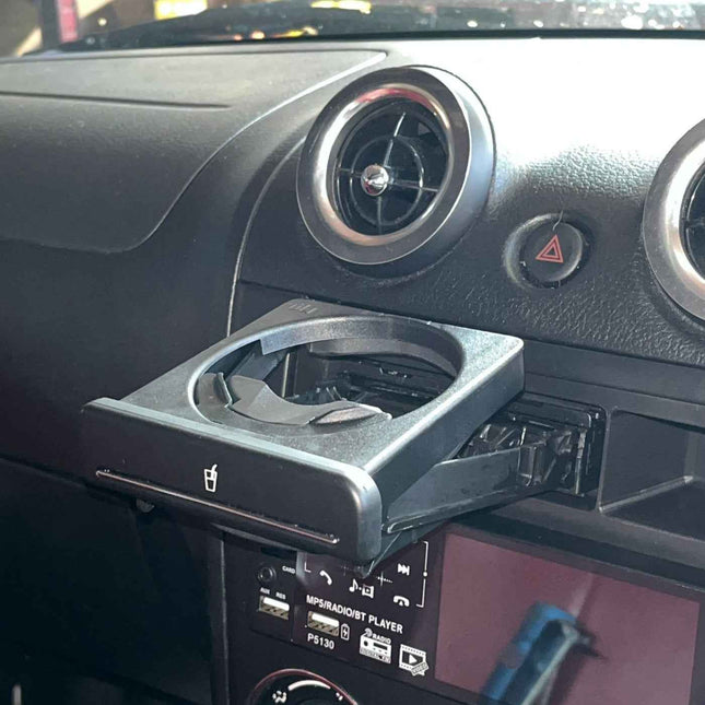 Schurkee Daihatsu Copen L880K cupholder, a sleek black car interior accessory for the Daihatsu Copen L880K model.